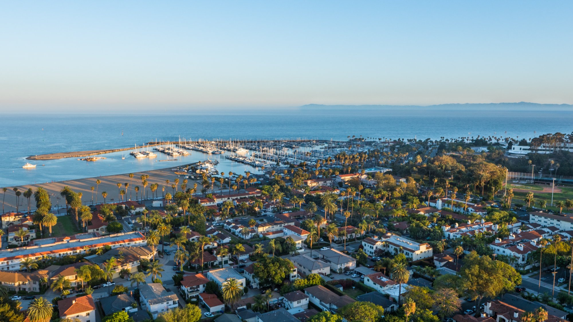 Santa Barbara coastal homes and harbor aerial view
